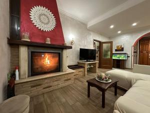 Televiisor ja/või meelelahutuskeskus majutusasutuses B&B Corvara