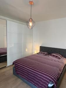 Ein Bett oder Betten in einem Zimmer der Unterkunft Dream in the heart of Le Marais