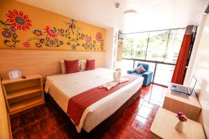 Postel nebo postele na pokoji v ubytování Mayu Boutique Hotel