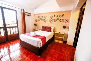 Postel nebo postele na pokoji v ubytování Mayu Boutique Hotel
