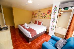Postel nebo postele na pokoji v ubytování Mayu Boutique Hotel