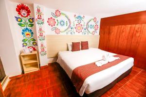 Postel nebo postele na pokoji v ubytování Mayu Boutique Hotel