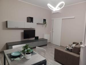 TV a/nebo společenská místnost v ubytování Casa Aria