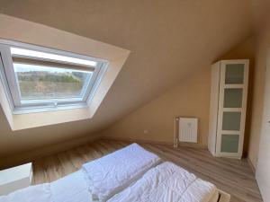 Postel nebo postele na pokoji v ubytování Hahnenklee Meine Perle + 4 fotografie