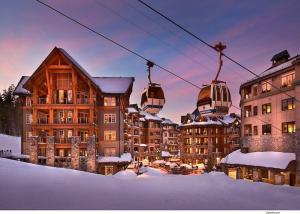 a resort in the snow with two ski lifts at Northstar Ski Trails Condo Walk to Village 3 Year-Round Hot Tubs in Rec. Center in Truckee