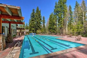 an empty swimming pool with a house and trees at Northstar Ski Trails Condo Walk to Village 3 Year-Round Hot Tubs in Rec. Center in Truckee