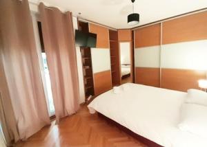 Ein Bett oder Betten in einem Zimmer der Unterkunft Beautiful Apartment, Close to Beach