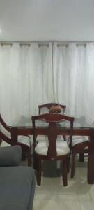 Ein Sitzbereich in der Unterkunft ApartaSuite El Encanto