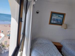 Postel nebo postele na pokoji v ubytování Mirador Azul Apart, 3 A,B,C