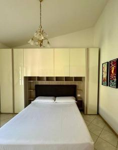 Giường trong phòng chung tại Creuza de Cinque Terre Apartment +23 ảnh