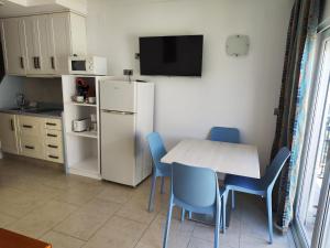 Kuchyňa alebo kuchynka v ubytovaní Apartamentos Caracas