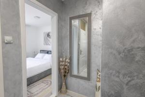 Letto o letti in una camera di Apartman Albijanić