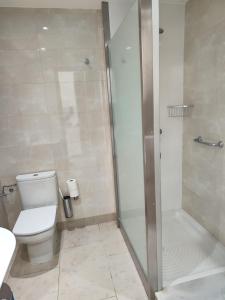 Kúpeľňa v ubytovaní Apartamentos Caracas