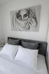 Letto o letti in una camera di Apartman Albijanić