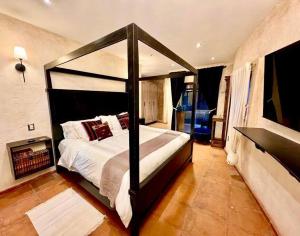Кровать или кровати в номере Albergo Doña Carmina en Val'Quirico