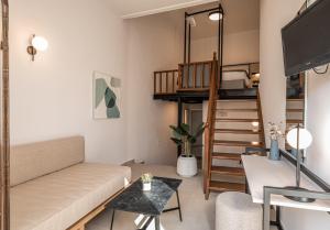 a living room with a couch and a bunk bed at Casa Veneta in Chania