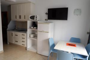 Kuchyňa alebo kuchynka v ubytovaní Apartamentos Caracas