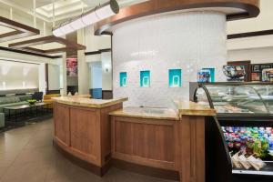 a lobby with a counter in a store at Hyatt Place Ft. Lauderdale/Plantation in Plantation