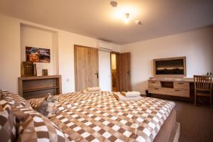 Cama o camas de una habitación en Camelot Ostrava