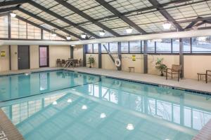 a large swimming pool in a building at Hyatt Place Minneapolis Eden Prairie in Eden Prairie