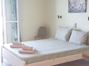 En eller flere senge i et værelse på FLORA STUDIOS CORFU - Adults only