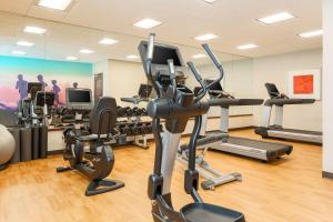 a gym with treadmills and elliptical machines at Hyatt Place UC Davis in Davis