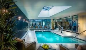 a swimming pool in a house with a building at Hyatt Place Baltimore Inner Harbor in Baltimore