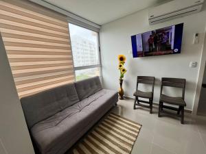 O zonă de relaxare la Apartamento ciudad Jardin Barranquilla