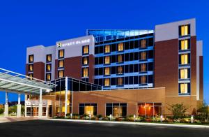 a rendering of the front of a hotel building at Hyatt Place Garden City in Garden City