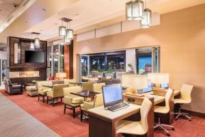 a lobby with a desk with a laptop on it at Hyatt Place Cleveland/Westlake/Crocker Park in Westlake
