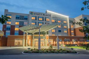 a large building with a sign that reads knight place at Hyatt Place Cincinnati/Sharonville Convention Center in Sharonville