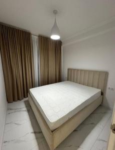 Cama o camas de una habitación en Maxim Burlacu