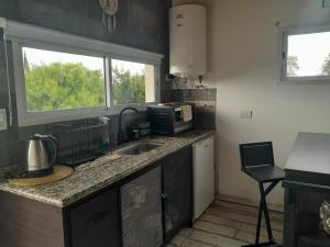 Køkken eller tekøkken på Departamento:La Aldea