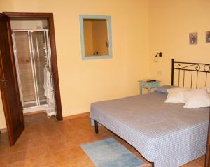 A bed or beds in a room at Podere Turicchio