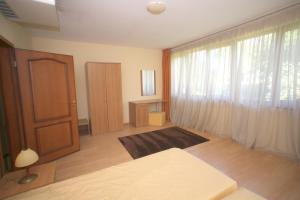A bed or beds in a room at Hotel Gloria Palace Diplomat
