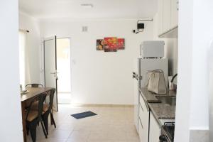 Kuchyň nebo kuchyňský kout v ubytování Alojamiento en Chajarí