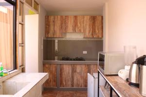 Η κουζίνα ή μικρή κουζίνα στο 2 de Mayo Apartamento 2do piso