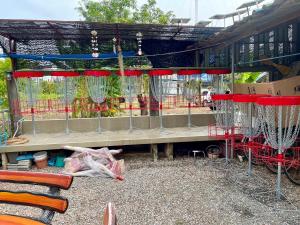 a bird cage with nets on a table at Pano Solar Guest House (พาโน โซล่า เกสเฮ้าส์ ) in Trat