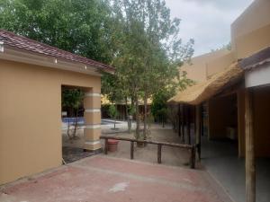a view of the courtyard of a building at Kamanga Safari Lodge in Maun