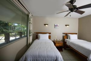 Una cama o camas en una habitación de Cozy getaway w/pool-tennis-bbq near Manuel Antonio 14 fotos más