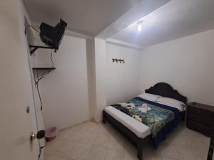 Katil atau katil-katil dalam bilik di Hotel Las Dalias