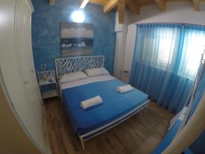 Postel nebo postele na pokoji v ubytování Villa Imago