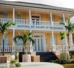 a building with a sign that reads national art gallery of thebahias at Downtown Nassau Oasis Unit 1 in Nassau