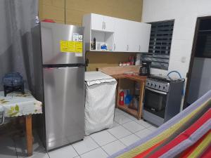 Kuchyň nebo kuchyňský kout v ubytování Apartamento 33