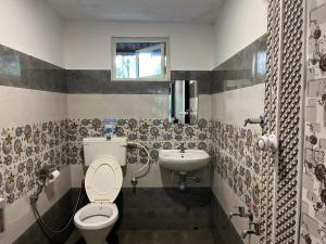 Vonios kambarys apgyvendinimo įstaigoje Maliyeckal Homestay