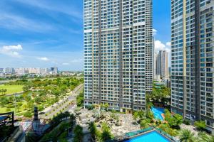 an aerial view of a city with tall buildings at Vinhomes Central Park Apartment- Landmark Luxury in Ho Chi Minh City