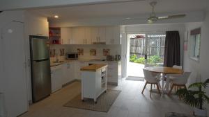 A kitchen or kitchenette at Noosa Gardens Riverside Resort