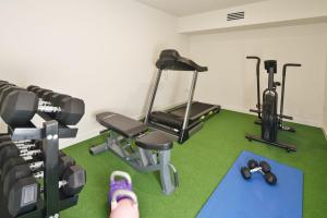 a room with a gym with two exercise bikes at Villa Parkana - Beachside Buddina in Buddina