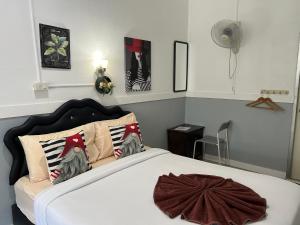 Postel nebo postele na pokoji v ubytování Labella samet guesthouse
