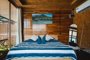 Postel nebo postele na pokoji v ubytování Phu Naphat Resort